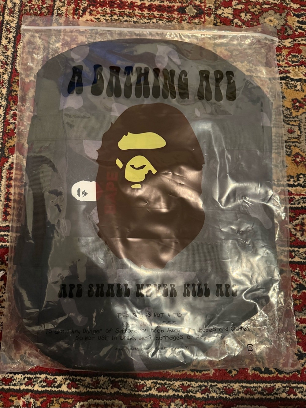 Bape Black Duffel Bag with Brown Ape Head and Yellow Face Details
